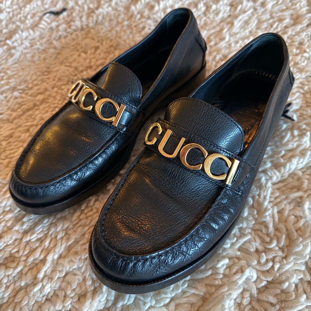 Gucci Black Leather Loafers with Gold Accents